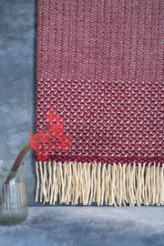 Plaid en laine bordeaux