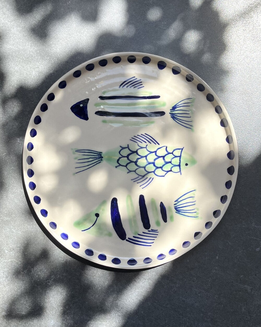 Round dish with Tribe rim
