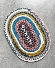 20cm round trivet in two-tone textile